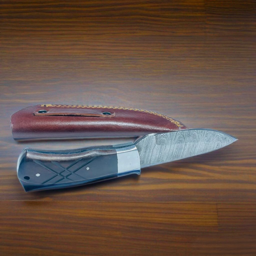Handcrafted Damascus Steel Knife with Black Wood Handle and Leather Sheath